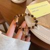 Pulsera retro personalizada moderna de lujo ligero elegante Ojo de Tigre Maillard pulsera con carácter fu regalo de cumpleaños para amigas pulsera