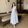 Moda Verão 2026 Plus Size Feminino Estilo Francês Blusa Irregular com Amarração e Conjunto Elegante de Saia