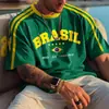 2026 Venda Quente Transfronteiriça Estilo Unissex Impresso em 3D Tendência Retrô Grande Caimento Solto Camiseta da Copa do Mundo Time de Futebol Brasil