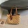 Bolso de mano simple, de gran capacidad, a la moda con lunares, elegante y chic, un bolso de hombro único y casual adecuado para el trabajo y los desplazamientos