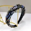 Nueva diadema trenzada de cristal de alta gama para mujer, elegante pinza para el pelo, accesorio para el cabello ancho estampado de lujo ligero