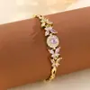 Pulsera de moda niche de diseño único de estilo ins europeo y americano con motivos de mariposa de circón y flor de hielo