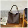 Bolsa de Ombro Única com Textura Trançada de Grande Capacidade para Moda Transfronteiriça 2026 Outono Nova Bolsinha Casual Retro para o Trabalho Bolsa Mãe e Filho