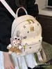 Mochila Nova Outono 2025 Versátil Fashionável Tendência Feminina Estudante Aula Grande Capacidade Mochila Bordada Retrô