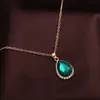 Nuevo Conjunto Versátil de Tres Piezas de Collar y Pendientes de Vidrio Multicolor Incrustados de Diamantes Europeos y Americanos Conjunto de Joyería Clásico de Cristal en Forma de Gota de Agua
