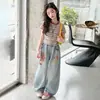 Conjunto de Niña Verano 2026 Nuevo Estilo Camiseta Rayada de Manga Corta para Niños Conjunto Estilo Coreano Pantalones de Mezclilla para Niños Grandes Conjunto de Dos Piezas