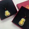 Nuevo colgante de Buda sonriente con incrustaciones de jade dorado imitación collar de Buda Maitreya de jade Hetian imitación Guanyin de jade blanco imitación bienestar en vivo al por mayor
