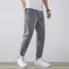 Pantalones vaqueros finos de nueve puntos de nuevo estilo para hombre, pantalones jogger de trabajo modernos estilo americano, pantalones casuales tipo harén holgados y versátiles para hombre