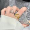 Versión coreana de anillo de amor hueco simple para mujer, diseño creativo tejido, anillo para el dedo índice, venta al por mayor, generación