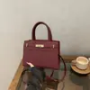 2026 Novo Modelo Luxo Leve Patchwork Embossado Fashionável Versátil Único High-End Elegante Estiloso Bolsa de Ombro Transversal