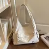 Bolsa de mão simples transfronteiriça de grande capacidade, nova moda outono 2026 bolsa de ombro versátil, bolsa de mão leve para o dia a dia