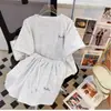Roupas de Corrida Conjunto Esportivo Feminino 2024 Chegada de Verão Elegante Solto Manga Curta Shorts Moda Casual Conjunto de Duas Peças