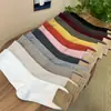 Calcetines Etna para Mujer Importados de Dongdaemun, Corea del SurDe Media Caña Lisos Acanalados Otoño e Invierno Nuevos Calcetines de Algodón en Gris al por Mayor