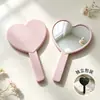 Espejo de mano en forma de corazón disponible en stock del fabricante, espejo de maquillaje portátil en forma de corazón, regalo promocional corporativo creativo, espejo de belleza al por mayor