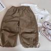 Overol Corea del Sur niños y niñas color liso overol para los pies cremallera para niños bolsillo pantalones deportivos verano 0052A040