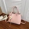 Bolso cruzado de un solo hombro casual a la moda Shuai Mi Jia, Bolso tipo cubo simple y elegante para mujer, Bolso de mano nuevo de moda y chic