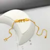 Tobillera vietnamita chapada en oro para mujer, nueva moda japonesa y coreana, tobillera con borla de moneda y trébol de cuatro hojas, joyería de pie de cobre chapado de alta gama