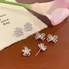 Pendientes de Flor y Lazo de Zirconia para Mujer, Púa de Plata, Súper Hada y Dulces de Cobre Microincrustados Nicho Lujo Accesible Gama Alta Versátiles