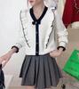 Tejido de Punto de Color Contrastante con Borde de Hongo y Lazo para Mujer, Ropa de Otoño e Invierno, Nuevo Top Interior Elegante y Rejuvenecedor de Manga Larga para la Nueva Era 2025