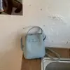 Bolso de mano liso de moda europea y americana 2026 nuevo modelo bolso tipo cesta de cuero genuino para mujer, bolso de hombro, bolso cruzado, bolso de mano