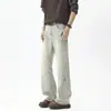 Nuevos jeans de otoño de estilo americano a la moda, de retazos, pierna recta y campana para hombre, pantalones largos versátiles y de moda con un diseño único