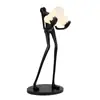 Lámpara de escultura abstracta de bola de personaje Lámpara de sala de exposiciones lámpara de oficina de ventas de hotel Lámpara de decoración artística lámpara de león lámpara de pie con forma humana