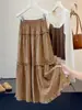 Saia Midi Feminina Retro Francesa com Estampa Floral Pequena e Borda de Orelha de Madeira Outono 2026 Nova Cintura Alta Emagrecedora Linha A Saia Bolo