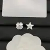Modelo Transfronterizo Nuevo 2025 Réplica Dior/Dior con Logo Estrella Nácar Trébol de Cuatro Hojas Pendientes CD Perla Venta al por Mayor