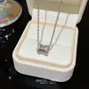 Moda Lujo Ligero Versátil Colgante de Cintura Pequeña Zirconia Microincrustada Cadena Corta para Clavícula Elegante de Alta Gama Acero de Titanio Collar para Mujeres