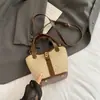 Bolso de paja estilo playero para vacaciones de verano, bolso de mano cruzado, nuevo y elegante bolso cesta con cierre de candado 2026, bolso tejido