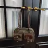 Bolso de Mano de Gama Alta Estilo Bolso de Bolos para Mujer 2025 Otoño e Invierno Nuevo Estilo Lujo Ligero Versátil Nicho Bolso de Hombro Debajo del Brazo Moderno