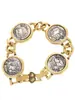 Juego de Monedas Vintage Estilo Francés con un Toque Elegante y Sofisticado, Incluyendo un Collar, Pulsera, Pendientes y Anillo de Monedas de Oro Vintage