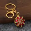 Llavero de estilo étnico con patrón octagonal, goteo de aceite e incrustaciones de diamantes, colgante de patrón vintage, regalo de recuerdo de viaje al por mayor