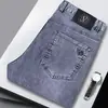 Venta al por mayor transfronteriza Jeans para hombre Verano Delgados Elásticos Rectos Sueltos Pantalones de moda Casual Versátil Algodón