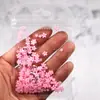 Arte de uñas flor de cinco pétalos joyería flor blanca pequeña bolsa mixta de tamaño de cuentas doradas y plateadas decoración de pegatina de uña de flor de resina venta al por mayor