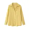 Ropa de mujer transfronteriza al por mayor 2026 nueva moda casual versátil color liso con botones manga larga cuello camisero top