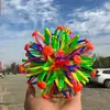 Pelota mágica telescópica luminosa grande pelota que florece pelota de contracción puesto de juguetes para niños al aire libre mercado nocturno suministro al por mayor