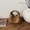 Bolsa de Bolos de Nicho Estilo Coreano para Mujer, Bolso de Mano de Moda Tendencia Nueva Primavera 2026, Bolso Cruzado de Forma de Concha de Alto Valor