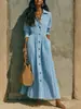 Colección de otoño 2026 europea y americana: Vestido largo blanco de alta gama, ajustado en la cintura, corte holgado, ropa para mujer talla grande, un artículo popular para ventas transfronterizas
