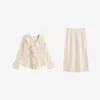 Conjunto de tricô com top de babados e meia-saia drapeada feminino 2026 inverno plus size temperamento suave conjunto de duas peças 25288