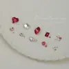 Paquete de material para manicura 2024 primavera y verano nuevo estilo mono mismo estilo hacha Corazón Torcido Cristal K9 diamante flash manicura al por mayor