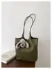 Bolso de hombro para mujer con alto atractivo estético, patrón tejido, nuevo bolso de moda para el día a día, bolso tote vintage relajado