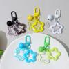 Llavero con colgante de estrella de cinco puntas hueca de color creativo, colgante de campana de acrílico, auricular para niña, decoración de bolso