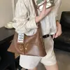 Bolso de Hombro Individual Retro de Nicho Coreano para Mujer 2026 Nuevo Bolso Tote de Gran Capacidad para el Trabajo con Acabado de Alta Gama y Diseño Cruzado