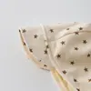 Sombrero de Bebé Coreano Qiunan Primavera 2026 Nueva Moda Correa a Prueba de Viento Protección para Orejas de Bebé Sombrero de Bebé