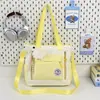 Nova Bolsa Casual de Nylon, Bolsa de Ombro de Mão para Estudante, Bolsa Transversal com Estampa de Desenho Animado, Bolsa Escolar para Estudante Feminina Atacado