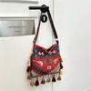 Bolso Bohemio de Borlas de Gran Capacidad 2026 Nuevo Estilo Étnico Nicho Punto Escénico de Xinjiang Bolso Cruzado de Hombro Único para Mujer