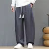 Calças harém oversized estilo chinês, calças largas e soltas, calças compridas de corte reto para primavera e outono, calças casuais para homens, com caimento fluido e estilo versátil