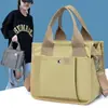Bolsa Tote Estilo Japonês Transfronteiriça 2023 Nova Bolsa de Lona Feminina Bolsa de Almoço Casual Mais Fácil de Combinar Bolsa de Mão Bolsa Transversal para o Trabalho