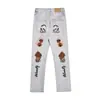 Estilo high street americano vibe caveira com chama bordada calça jeans masculina e feminina reta flare calça handsome de rua frita